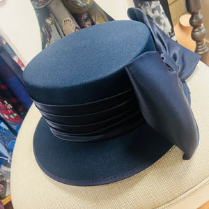 Classic navy fabric special occasion hat with large bow