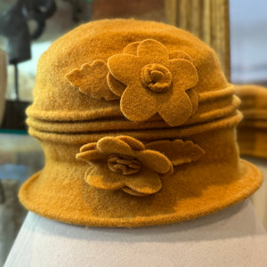 A Cosy Wool Cloche Hat With Flower