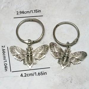 Boot Charm Skull Moths (pair)