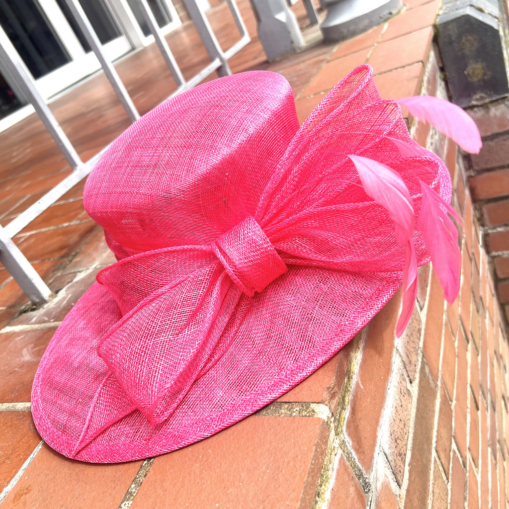 A Sinamay Wide Brim Hat With Triple Loop Bow