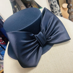 Classic navy fabric special occasion hat with large bow