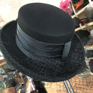 Wide brimmed netted hat