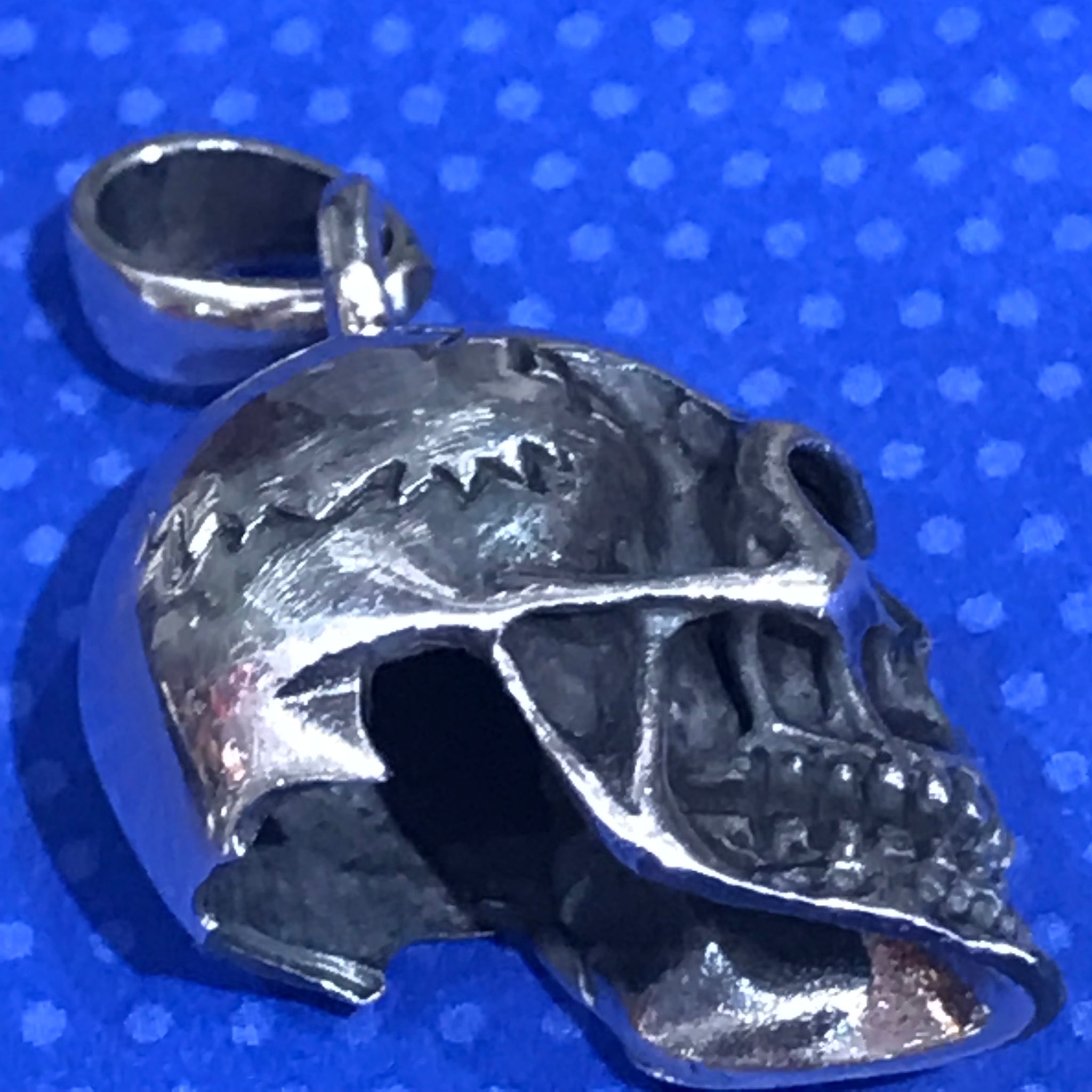 Silver skull pendant