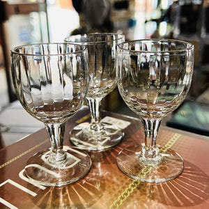 Three fluted liqueur glasses