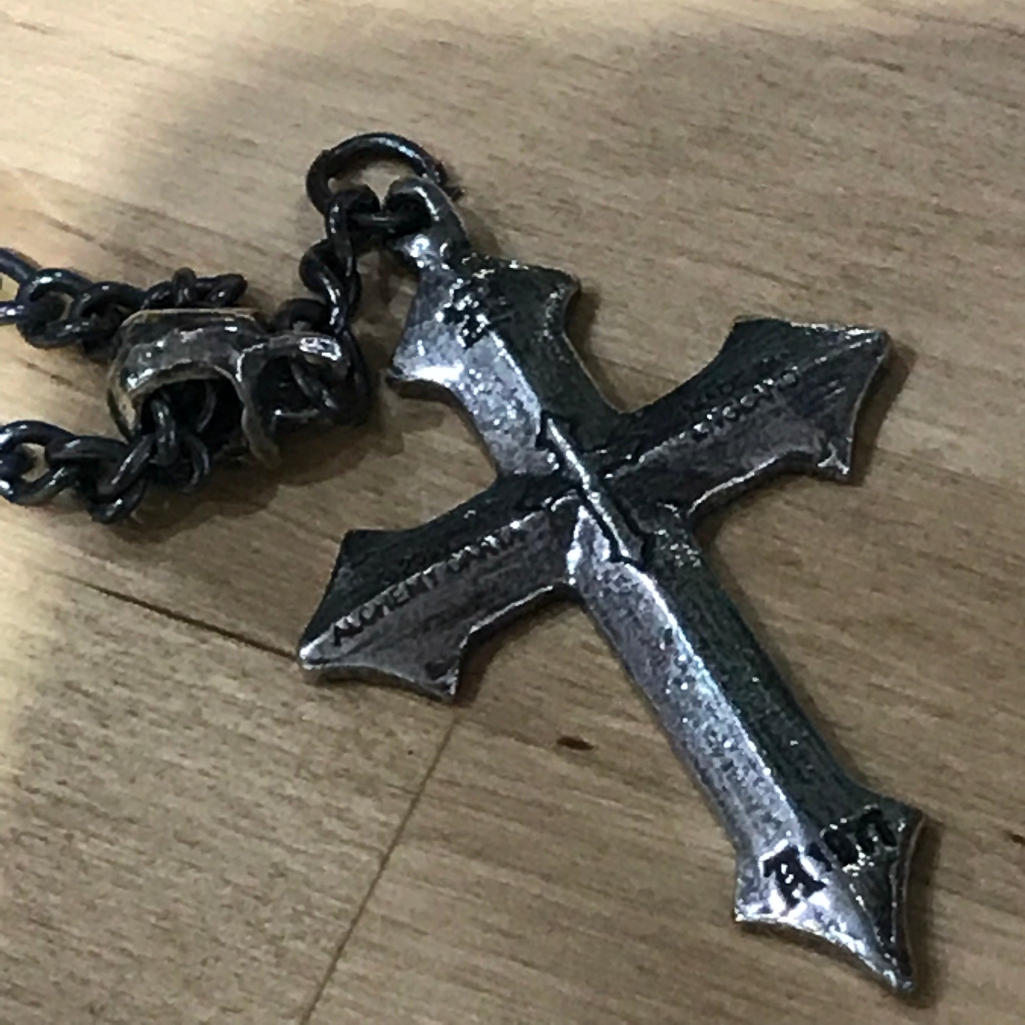 Pewter Osbourne’s cross pendant