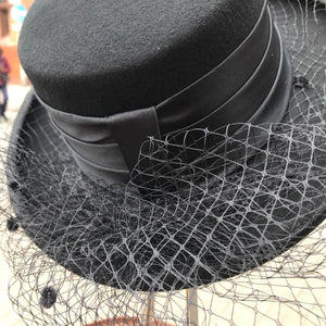 Wide brimmed netted hat
