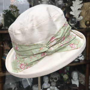 Cream cotton hat with green floral band