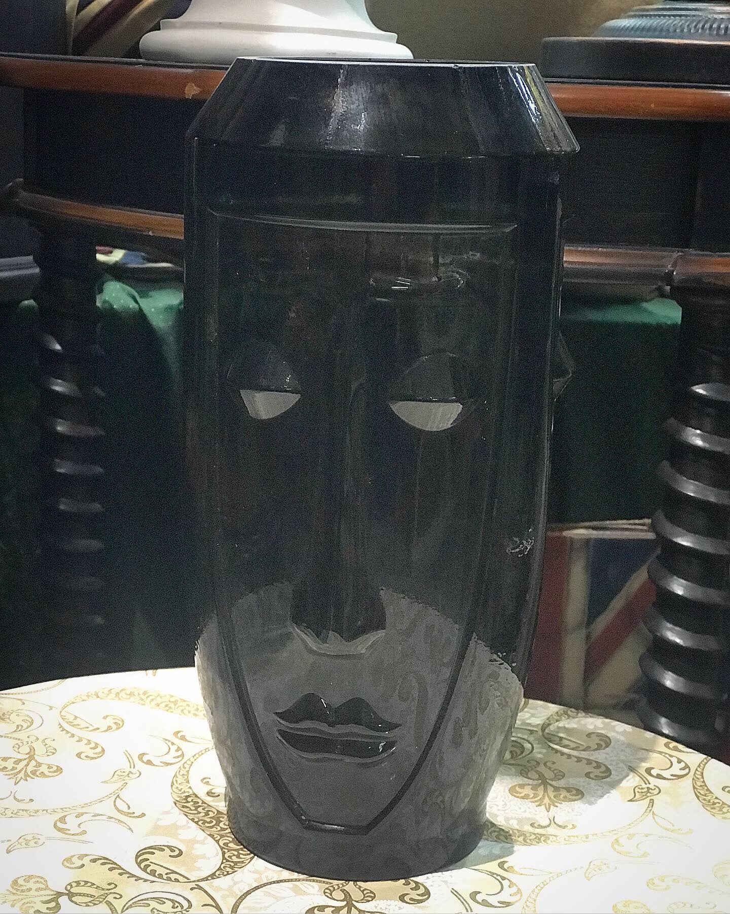 Black tall face vase