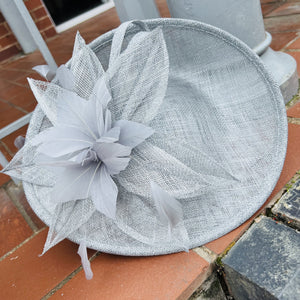 A Sinamay Disc Fascinator Feathers & Flowers