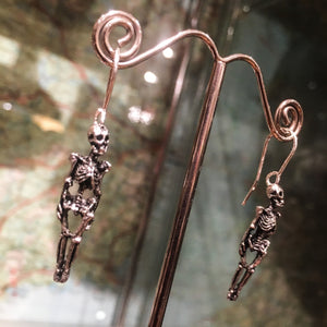 Skeleton drop earrings